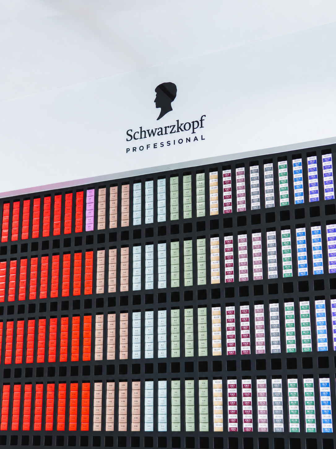 Schwarzkopf Professional colour wall stocked with hair colour tubes at EDITION Salon